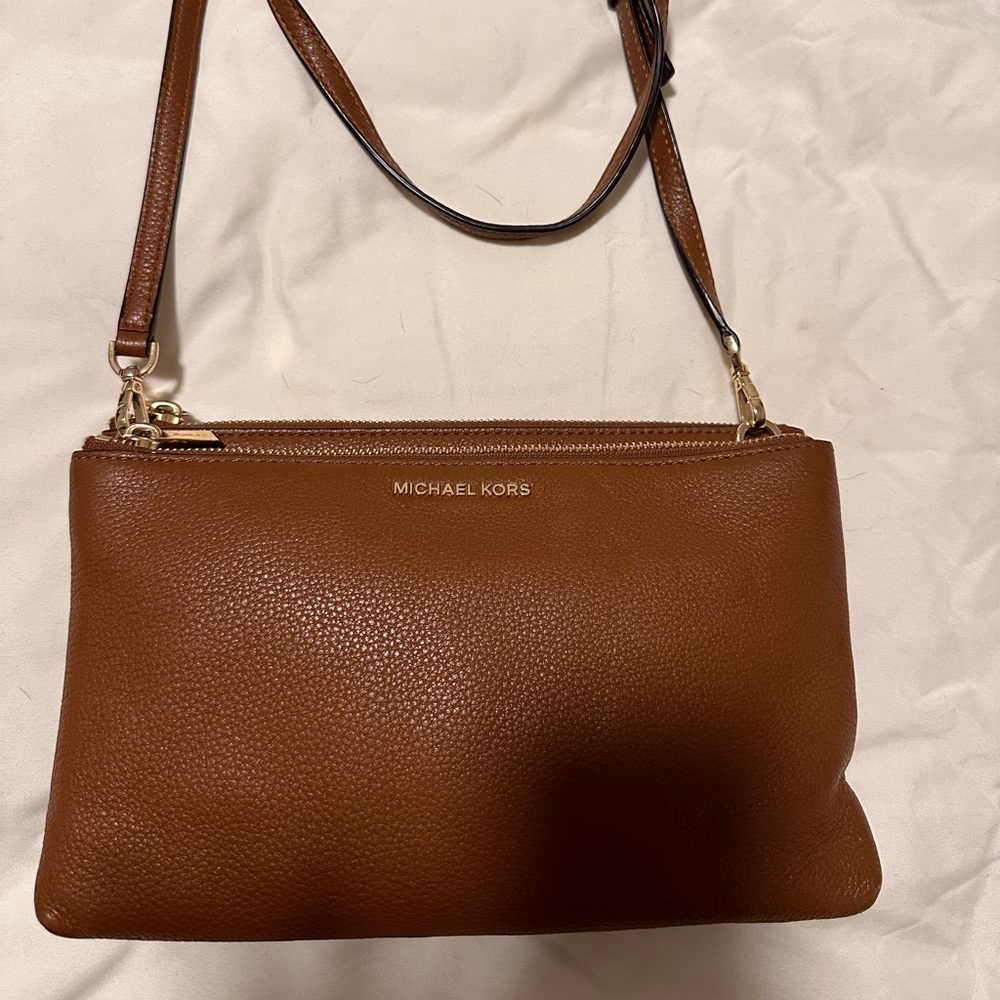MICHAEL KORS
Leather Trimmed Crossbody Bag